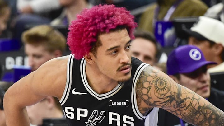 Jan 22, 2026; Salt Lake City, Utah, USA; San Antonio Spurs forward Jeremy Sochan (10) stretches before substituting in during the second half against the Utah Jazz at Delta Center. Mandatory Credit: Peter Creveling-Imagn Images