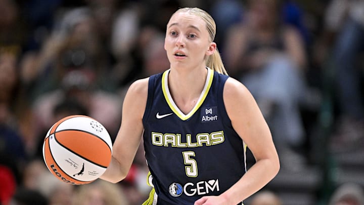 Jun 27, 2025; Dallas, Texas, USA; Dallas Wings guard Paige Bueckers (5) brings the ball up court against the Indiana Fever during the second quarter at the American Airlines Center. Mandatory Credit: Jerome Miron-Imagn Images