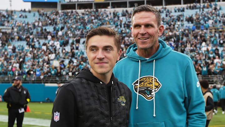 Jan 4, 2026; Jacksonville, Florida, USA; Jacksonville Jaguars general manager James Gladstone (left) and executive vice president of football operations Tony Boselli stand on the field after the game against the Tennessee Titans at EverBank Stadium. Mandatory Credit: Travis Register-Imagn Images