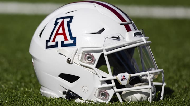 Nov 25, 2022; Tucson, Arizona, USA; Detailed view of an Arizona Wildcats helmet on the field during the Territorial Cup at Arizona Stadium. Mandatory Credit: Mark J. Rebilas-Imagn Images