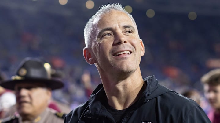 Florida State Seminoles head coach Mike Norvell smiles to the crowd after the game against the Florida Gators at Steve Spurrier Field at Ben Hill Griffin Stadium in Gainesville, FL on Saturday, November 25, 2023. [Matt Pendleton/Gainesville Sun]