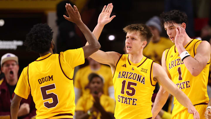 Jan 24, 2026; Tempe, Arizona, USA; Arizona State Sun Devils guard Maurice Odum (5) celebrates with teammate Noah Meeusen (15) against the Cincinnati Bearcats in the first half at Desert Financial Arena. Mandatory Credit: Mark J. Rebilas-Imagn Images Jan 24, 2026; Tempe, Arizona, USA; Arizona State Sun Devils guard Maurice Odum (5) celebrates with teammate Noah Meeusen (15) against the Cincinnati Bearcats in the first half at Desert Financial Arena. Mandatory Credit: Mark J. Rebilas-Imagn Images