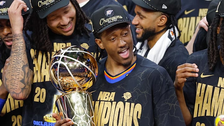 Jun 22, 2025; Oklahoma City, Oklahoma, USA; Oklahoma City Thunder forward Jalen Williams (8) holds the NBA Larry O'Brien Championship Trophy at the end of game seven of the 2025 NBA Finals after defeating the Indiana Pacers at Paycom Center. Mandatory Credit: Alonzo Adams-Imagn Images Jun 22, 2025; Oklahoma City, Oklahoma, USA; Oklahoma City Thunder forward Jalen Williams (8) holds the NBA Larry O'Brien Championship Trophy at the end of game seven of the 2025 NBA Finals after defeating the Indiana Pacers at Paycom Center. Mandatory Credit: Alonzo Adams-Imagn Images