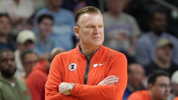 Illinois Fighting Illini head coach Brad Underwood watches as his team plays March 21, 2026 during the first half of the NCAA Men’s Basketball Tournament second round game against VCU at the Bon Secours Wellness Arena in Greenville, South Carolina. Illinois Fighting Illini head coach Brad Underwood watches as his team plays March 21, 2026 during the first half of the NCAA Men’s Basketball Tournament second round game against VCU at the Bon Secours Wellness Arena in Greenville, South Carolina.