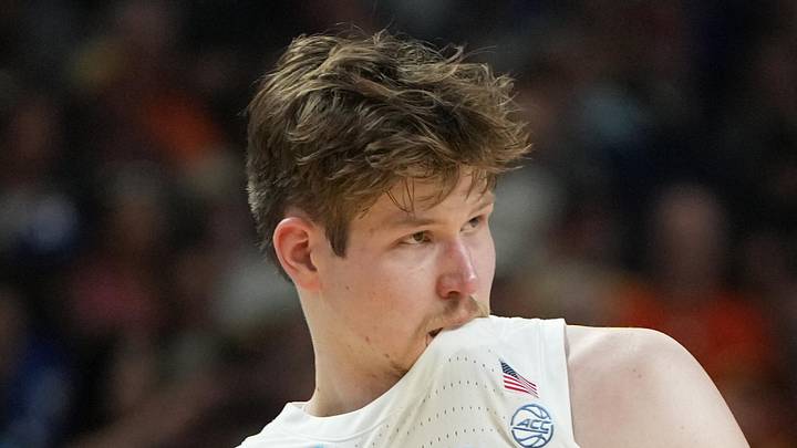 Mar 19, 2026; Greenville, SC, USA; North Carolina Tar Heels center Henri Veesaar (13) bites his jersey against the VCU Rams in the second half of a first round game of the men's 2026 NCAA Tournament at Bon Secours Wellness Arena. Mandatory Credit: Bob Donnan-Imagn Images