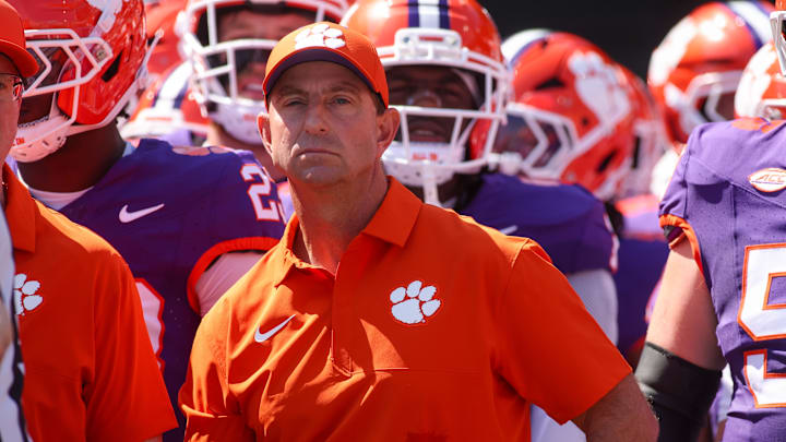 Sep 13, 2025; Atlanta, Georgia, USA; Clemson Tigers head coach Dabo Swinney prepares to run on the field with his team before a game against the Georgia Tech Yellow Jackets at Bobby Dodd Stadium at Hyundai Field. Mandatory Credit: Brett Davis-Imagn Images