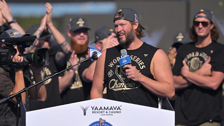 Los Angeles Dodgers pitcher Clayton Kershaw (22) speaks to fans during the World Series celebration at Dodger Stadium on Monday.