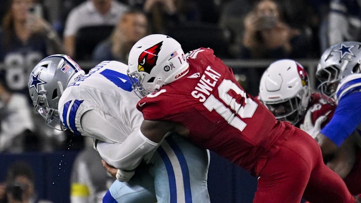 Nov 3, 2025; Arlington, Texas, USA; Arizona Cardinals linebacker Josh Sweat (10) sacks Dallas Cowboys quarterback Dak Prescott (4) during the game between the Dallas Cowboys and the Arizona Cardinals at AT&T Stadium. 