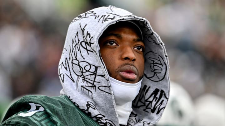 Michigan State's Jalen Thompson dressed in street clothes looks on from the sideline during the first quarter in the game against UCLA on Saturday, Oct. 11, 2025, at Spartan Stadium in East Lansing.