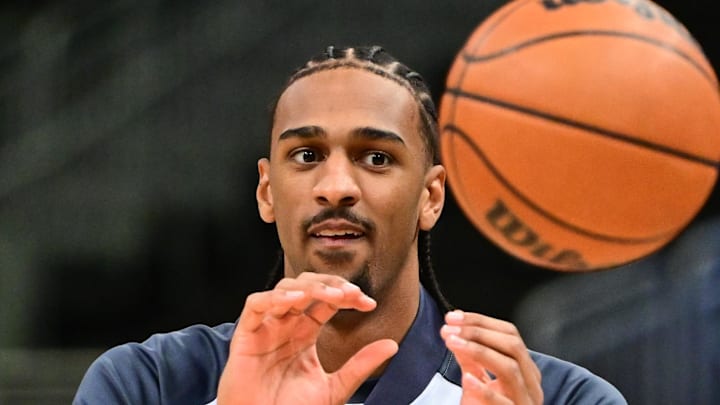 Dec 21, 2024; Milwaukee, Wisconsin, USA;  Washington Wizards center Alex Sarr (20) warms up before a game against the Milwaukee Bucks at Fiserv Forum. Mandatory Credit: Benny Sieu-Imagn Images