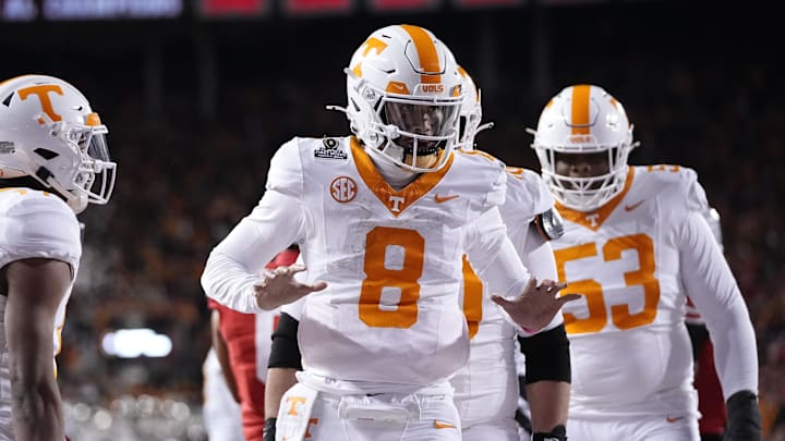 Dec 21, 2024; Columbus, Ohio, USA; Tennessee Volunteers quarterback Nico Iamaleava (8) celebrates after running for a touchdown against the Ohio State Buckeyes during the first half of a College Football Playoff first round game at Ohio Stadium. Mandatory Credit: Adam Cairns-Imagn Images