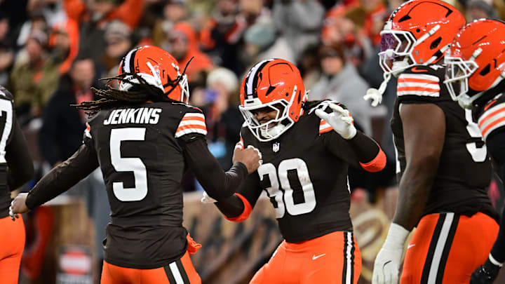 Nov 16, 2025; Cleveland, Ohio, USA; Cleveland Browns linebacker Devin Bush (30) celebrates with safety Rayshawn Jenkins (5) after returning an interception for a touchdown during the second quarter against the Baltimore Ravens at Huntington Bank Field. Mandatory Credit: Ken Blaze-Imagn Images
