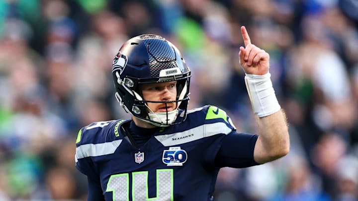 Sam Darnold of the Seattle Seahawks calls a play Sam Darnold of the Seattle Seahawks calls a play