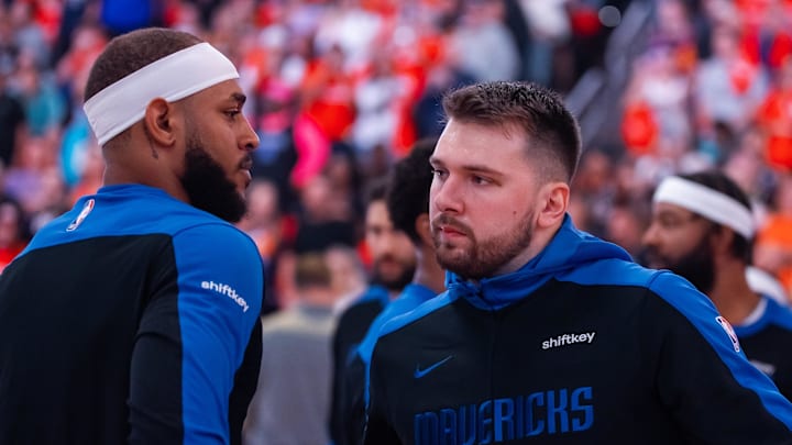 Oct 26, 2024; Phoenix, Arizona, USA; Dallas Mavericks guard Luka Doncic (right) with center Daniel Gafford against the Phoenix Suns at Footprint Center. Mandatory Credit: Mark J. Rebilas-Imagn Images Oct 26, 2024; Phoenix, Arizona, USA; Dallas Mavericks guard Luka Doncic (right) with center Daniel Gafford against the Phoenix Suns at Footprint Center. Mandatory Credit: Mark J. Rebilas-Imagn Images