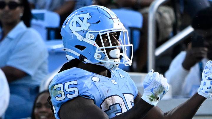 Sep 13, 2025; Chapel Hill, North Carolina, USA; North Carolina Tar Heels running back Demon June (35) celebrates after scoring a touchdown in the fourth quarter at Kenan Stadium. Mandatory Credit: Bob Donnan-Imagn Images Sep 13, 2025; Chapel Hill, North Carolina, USA; North Carolina Tar Heels running back Demon June (35) celebrates after scoring a touchdown in the fourth quarter at Kenan Stadium. Mandatory Credit: Bob Donnan-Imagn Images