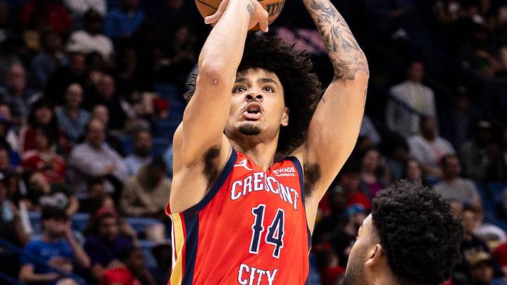 Apr 7, 2026; New Orleans, Louisiana, USA; New Orleans Pelicans guard/forward Micah Peavy (14) shoots the ball against Utah Jazz forward Brice Sensabaugh (28) during the first half at Smoothie King Center. Mandatory Credit: Stephen Lew-Imagn Images Apr 7, 2026; New Orleans, Louisiana, USA; New Orleans Pelicans guard/forward Micah Peavy (14) shoots the ball against Utah Jazz forward Brice Sensabaugh (28) during the first half at Smoothie King Center. Mandatory Credit: Stephen Lew-Imagn Images