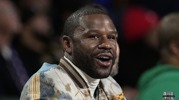 Dec 14, 2024; Las Vegas, Nevada, USA; Floyd Mayweather looks on during the first half between the Milwaukee Bucks and the Atlanta Hawks in a semifinal of the 2024 Emirates NBA Cup at T-Mobile Arena. Mandatory Credit: Kyle Terada-Imagn Images