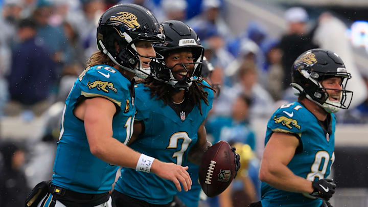 Jacksonville Jaguars wide receiver Jakobi Meyers (3) celebrates his touchdown with quarterback Trevor Lawrence (16) and wide receiver Austin Trammell (81) during the first quarter of an NFL football game at EverBank Stadium, Sunday, Dec. 7, 2025, in Jacksonville, Fla. [Corey Perrine/Florida Times-Union]