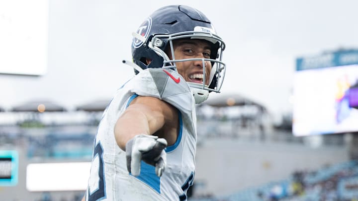 Dec 29, 2024; Jacksonville, Florida, USA; Tennessee Titans wide receiver Nick Westbrook-Ikhine (15) celebrates a touchdown in the third quarter against the Jacksonville Jaguars at EverBank Stadium. Mandatory Credit: Jeremy Reper-Imagn Images