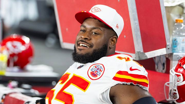 Aug 9, 2025; Glendale, Arizona, USA; Kansas City Chiefs guard Trey Smith (65) against the Arizona Cardinals during a preseason NFL game at State Farm Stadium. Mandatory Credit: Mark J. Rebilas-Imagn Images