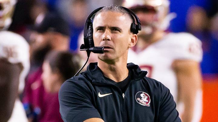 Florida State Seminoles head coach Mike Norvell looks to the replay screen at Steve Spurrier Field at Ben Hill Griffin Stadium in Gainesville, FL on Saturday, November 25, 2023 during the first half. [Doug Engle/Gainesville Sun]