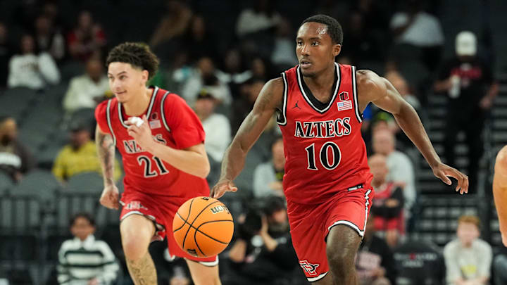 Nov 25, 2025; Las Vegas, Nevada, USA; San Diego State Aztecs guard BJ Davis (10) drives the ball in the second half against the Oregon Ducks. Nov 25, 2025; Las Vegas, Nevada, USA; San Diego State Aztecs guard BJ Davis (10) drives the ball in the second half against the Oregon Ducks.
