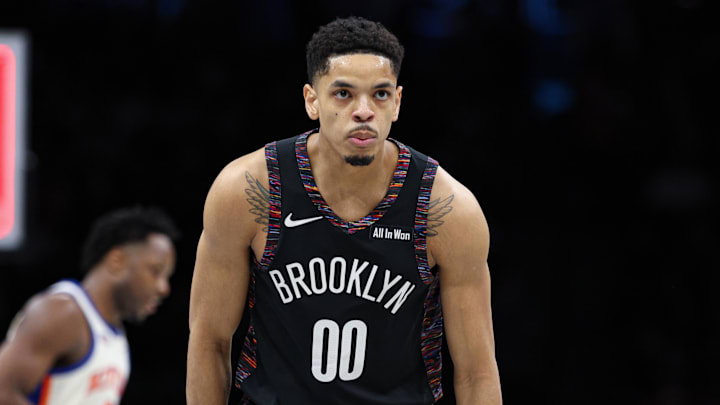 Mar 20, 2026; Brooklyn, New York, USA; Brooklyn Nets forward Josh Minott (00) reacts after making a three point basket during the first half against the New York Knicks at Barclays Center. Mandatory Credit: Vincent Carchietta-Imagn Images