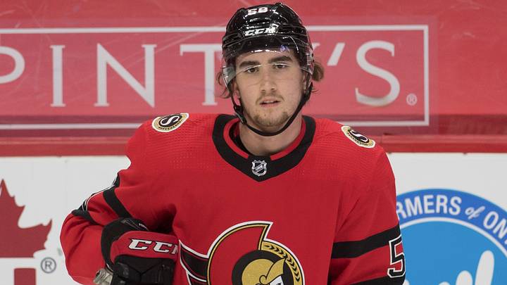 Apr 1, 2021; Ottawa, Ontario, CAN; Ottawa Senators left wing Alex Formenton (59) stretches during warmup prior to game against the Montreal Canadiens at the Canadian Tire Centre. Mandatory Credit: Marc DesRosiers-USA TODAY Sports