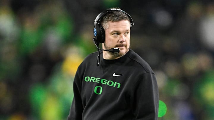 Dec 20, 2025; Eugene, OR, USA;  Oregon Ducks head coach Dan Lanning looks on during the fourth quarter against the James Madison Dukes at Autzen Stadium. 
