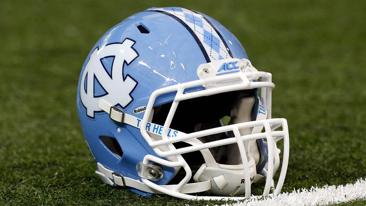 Sep 3, 2016; Atlanta, GA, USA; A North Carolina Tar Heels helmet on the field prior to the 2016 Chick-Fil-A Kickoff game against the Georgia Bulldogs at Georgia Dome. Mandatory Credit: Brett Davis-USA TODAY Sports Sep 3, 2016; Atlanta, GA, USA; A North Carolina Tar Heels helmet on the field prior to the 2016 Chick-Fil-A Kickoff game against the Georgia Bulldogs at Georgia Dome. Mandatory Credit: Brett Davis-USA TODAY Sports