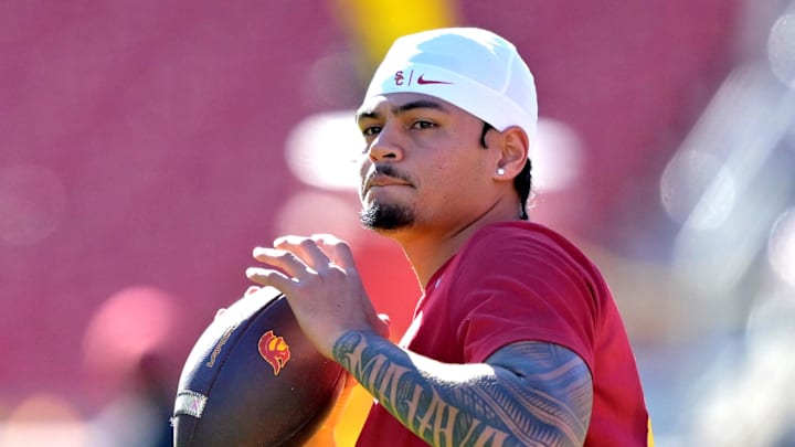 Oct 11, 2025; Los Angeles, California, USA;  USC Trojans quarterback Jayden Maiava (14) warms up prior to the game against the Michigan Wolverines at United Airlines Field at the Los Angeles Memorial Coliseum. Mandatory Credit: Jayne Kamin-Oncea-Imagn Images