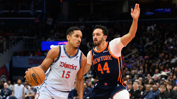 Dec 30, 2024; Washington, District of Columbia, USA; Washington Wizards guard Malcolm Brogdon (15) drives to the basket as New York Knicks guard Landry Shamet (44) defends during the third quarter at Capital One Arena. Mandatory Credit: Reggie Hildred-Imagn Images