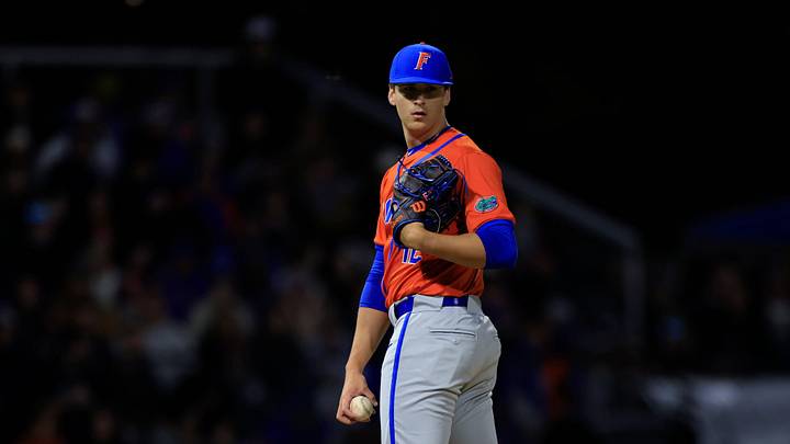 Florida pitcher Liam Peterson (12) looks on from the pitcher   s mound during the second inning of an NCAA baseball matchup Tuesday, Feb. 20, 2024 at the University of North Florida   s Harmon Stadium in Jacksonville, Fla. Florida blanked North Florida 10-0 in seven innings. [Corey Perrine/Florida Times-Union]