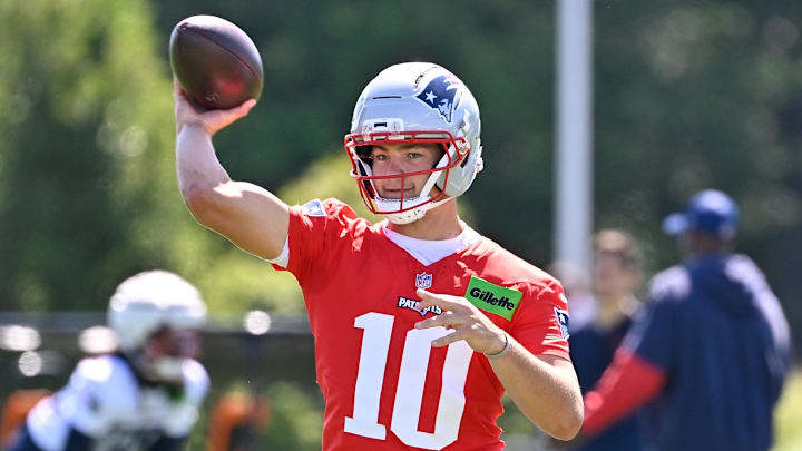 Jul 23, 2025; Foxborough, MA, USA; New England Patriots quarterback Drake Maye (10) throws a pass during training camp at Gillette Stadium. Mandatory Credit: Eric Canha-Imagn Images
