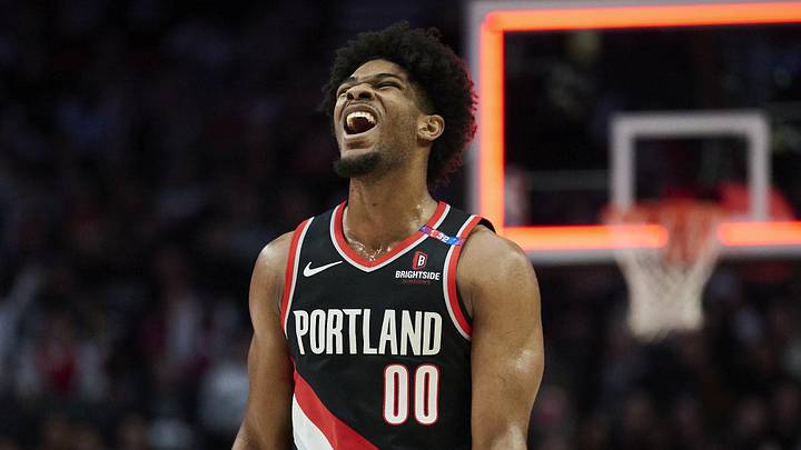 Feb 22, 2025; Portland, Oregon, USA; Portland Trail Blazers guard Scoot Henderson (00) reacts after missing a three point basket during the second half against the Charlotte Hornets at Moda Center. Mandatory Credit: Troy Wayrynen-Imagn Images