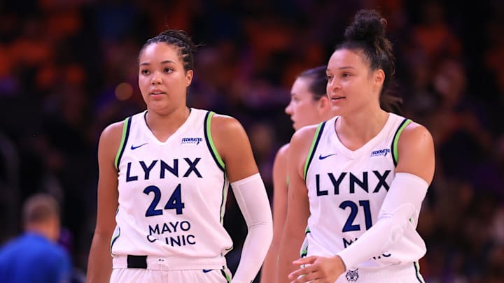 Jul 9, 2025; Phoenix, Arizona, USA; Minnesota Lynx forward Napheesa Collier (24) and guard Kayla McBride (21) against the Phoenix Mercury at PHX Arena. Mandatory Credit: Mark J. Rebilas-Imagn Images