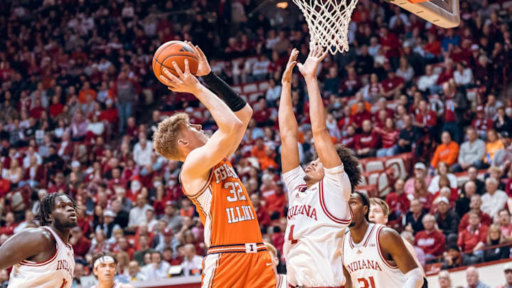 Illinois point guard Kasparas Jakucionis (32) goes to the rim against Indiana guard Myles Rice in the Illini's 94-69 win over the Hoosiers on Tuesday at Simon Skjodt Assembly Hall in Bloomington, Indiana. Illinois point guard Kasparas Jakucionis (32) goes to the rim against Indiana guard Myles Rice in the Illini's 94-69 win over the Hoosiers on Tuesday at Simon Skjodt Assembly Hall in Bloomington, Indiana.