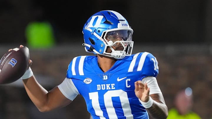 Aug 28, 2025; Durham, North Carolina, USA; Duke Blue Devils quarterback Darian Mensah (10) goes to throw the ball against the Elon Phoenix during the first half at Wallace Wade Stadium. Mandatory Credit: James Guillory-Imagn Images Aug 28, 2025; Durham, North Carolina, USA; Duke Blue Devils quarterback Darian Mensah (10) goes to throw the ball against the Elon Phoenix during the first half at Wallace Wade Stadium. Mandatory Credit: James Guillory-Imagn Images