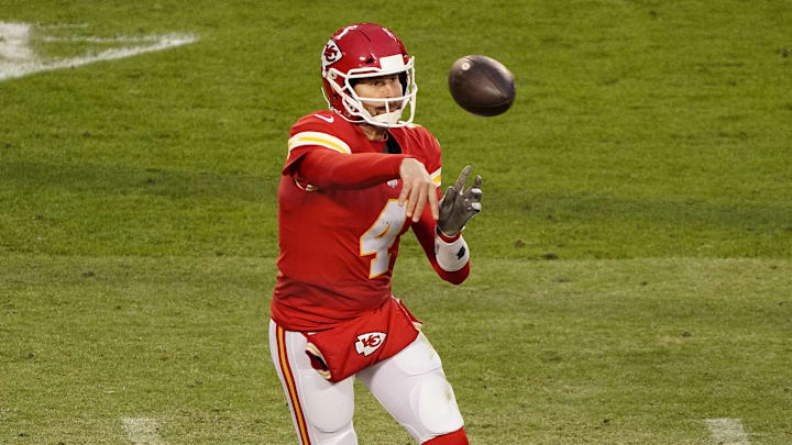 Jan 17, 2021; Kansas City, Missouri, USA; Kansas City Chiefs quarterback Chad Henne (4) throws against the Cleveland Browns during the second half in the AFC Divisional Round playoff game at Arrowhead Stadium. Mandatory Credit: Jay Biggerstaff-Imagn Images