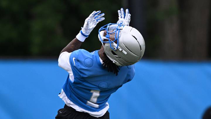Detroit Lions wide receiver Jameson Williams (1) catches a pass during the Detroit Lions veteran’s minicamp