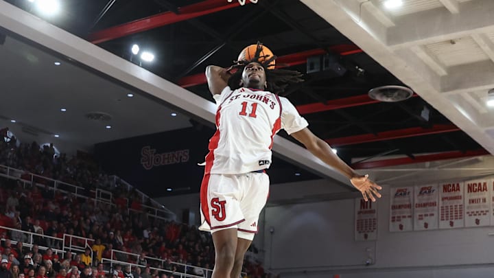 Nov 15, 2025; Queens, New York, USA;  St. John's basketball guard Ian Jackson (11) goes up for a dunk in the second half against the William & Mary Tribe at Carnesecca Arena.
