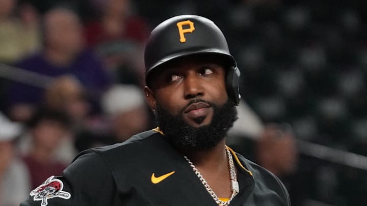 May 5, 2026; Phoenix, Arizona, USA; Pittsburgh Pirates designated hitter Marcell Ozuna (24) reacts after challenging a pitch against the Arizona Diamondbacks in the ninth inning at Chase Field. Mandatory Credit: Rick Scuteri-Imagn Images