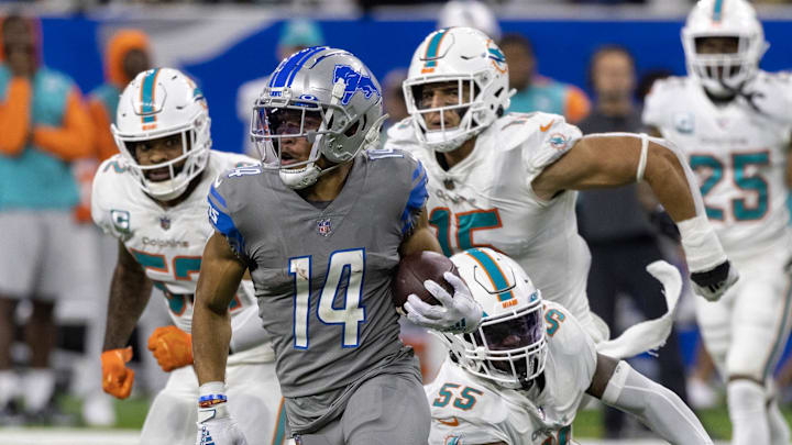 Detroit Lions wide receiver Amon-Ra St. Brown (14).