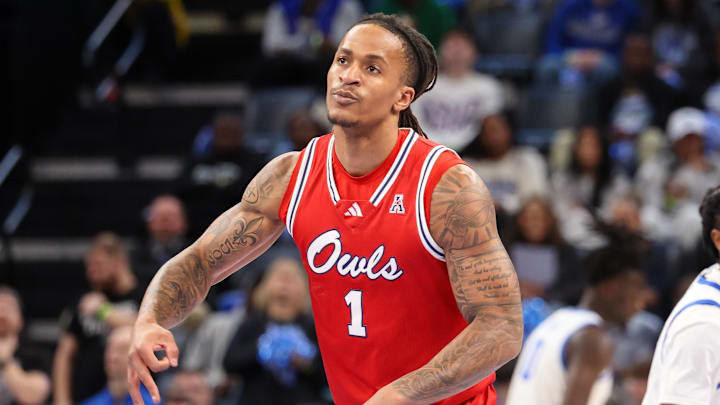 Feb 23, 2025; Memphis, Tennessee, USA; Florida Atlantic Owls forward Kaleb Glenn (1) reacts after a three point basket against the Memphis Tigers during the first half at FedExForum. Mandatory Credit: Wesley Hale-Imagn Images