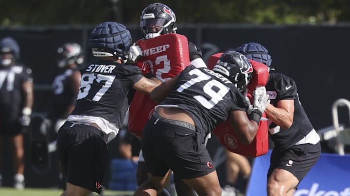 Houston Texans tight end Cade Stover (87) and Houston Texans Aireontae Ersery (79) during training camp at Houston Methodist Training Center.