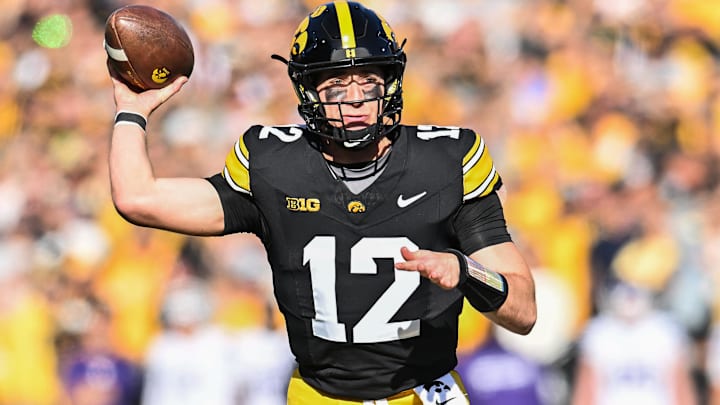 Oct 26, 2024; Iowa City, Iowa, USA; Iowa Hawkeyes quarterback Cade McNamara throws a pass against the Northwestern Wildcats during the first quarter at Kinnick Stadium. Mandatory Credit: Jeffrey Becker-Imagn Images