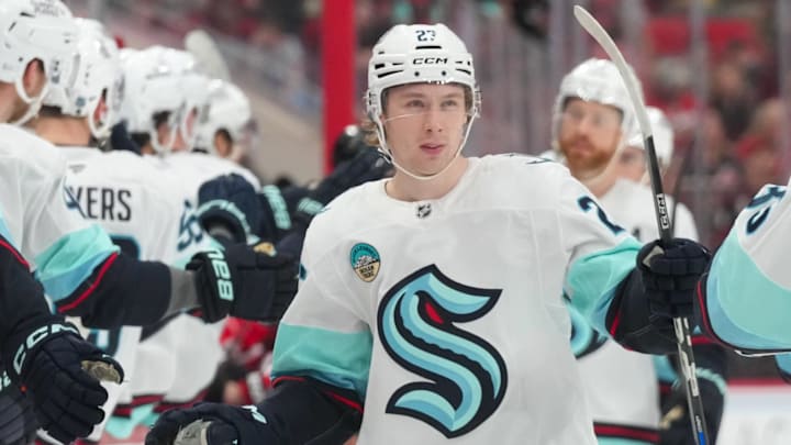 Jan 10, 2026; Raleigh, North Carolina, USA;  Seattle Kraken center Berkly Catton (27) celebrates his goal against the Carolina Hurricanes during the third period at Lenovo Center. Mandatory Credit: James Guillory-Imagn Images