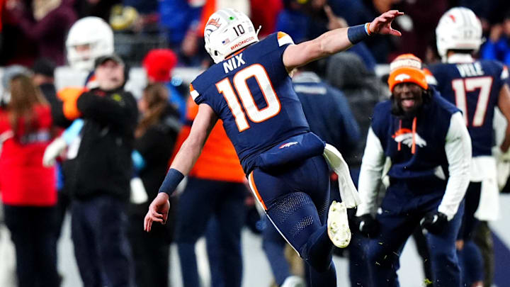 Dec 2, 2024; Denver, Colorado, USA; Denver Broncos quarterback Bo Nix (10) celebrates following a touchdown in the third quarter against the Cleveland Browns at Empower Field at Mile High.
