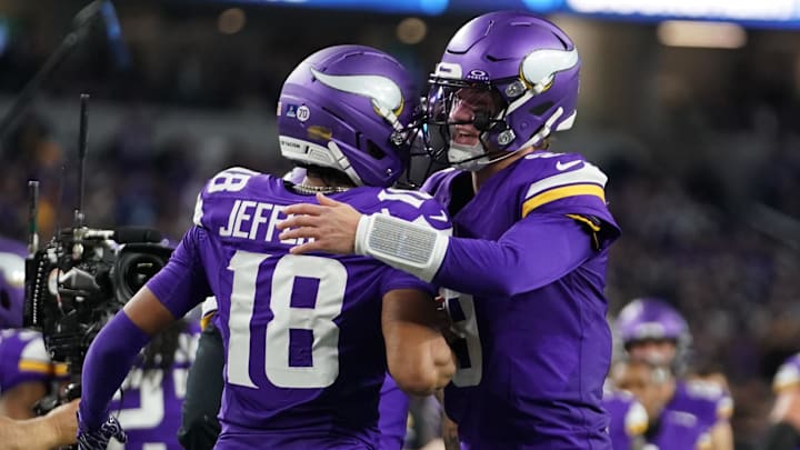 Dec 14, 2025; Arlington, Texas, USA; Minnesota Vikings wide receiver Justin Jefferson (18) celebrates with quarterback J.J. McCarthy (9) after a Vikings touchdown during the second half against the Dallas Cowboys at AT&T Stadium.