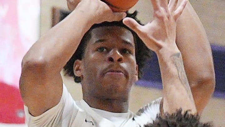 Stepinac’s Jasiah Jervis (25) puts up a shot against Holy Cross during basketball action at Archbishop Stepinac High School in White Plains Jan. 13, 2026. Stepinac won the game 60-49.